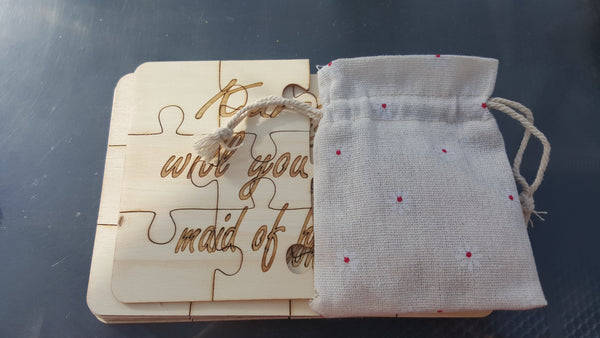 Puzzle Message Pieces in a Decorative Bag.